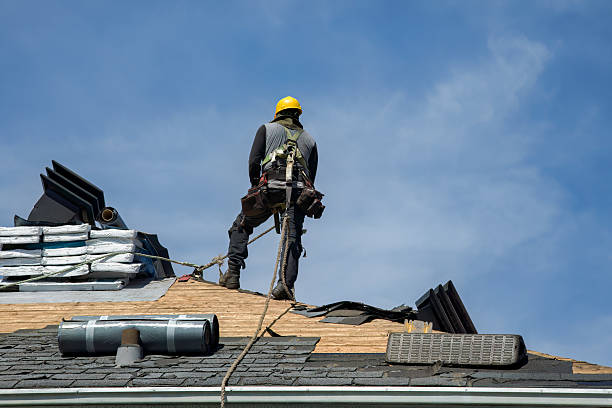 Professional Gutter Installation technician working in Howell, MI